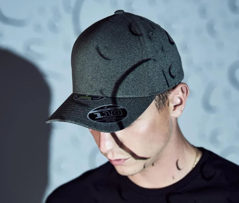 110 Melange Unipanel — customisable Caps & hats by Flexfit
