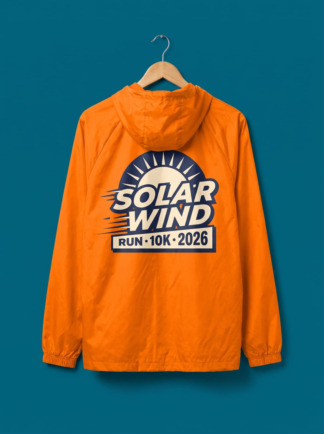 La pièce — B&C #RESET Windbreaker Meta Orange, impression softshell en grand format, dans le dos