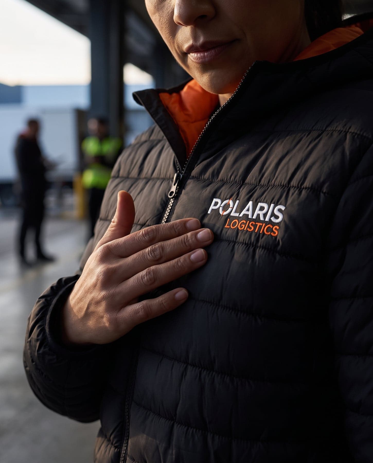 Le marquage — Result Soft Padded Jacket Black/Orange, broderie au cœur, devant