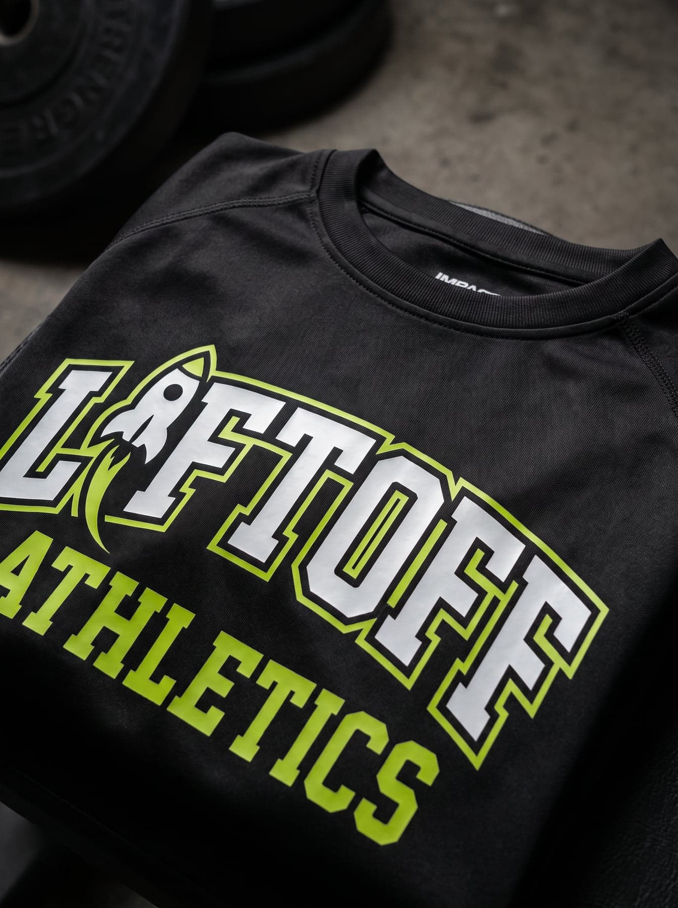 Le marquage — Spiro Impact Performance Aircool Tee Black, transfert DTF en grand format, devant