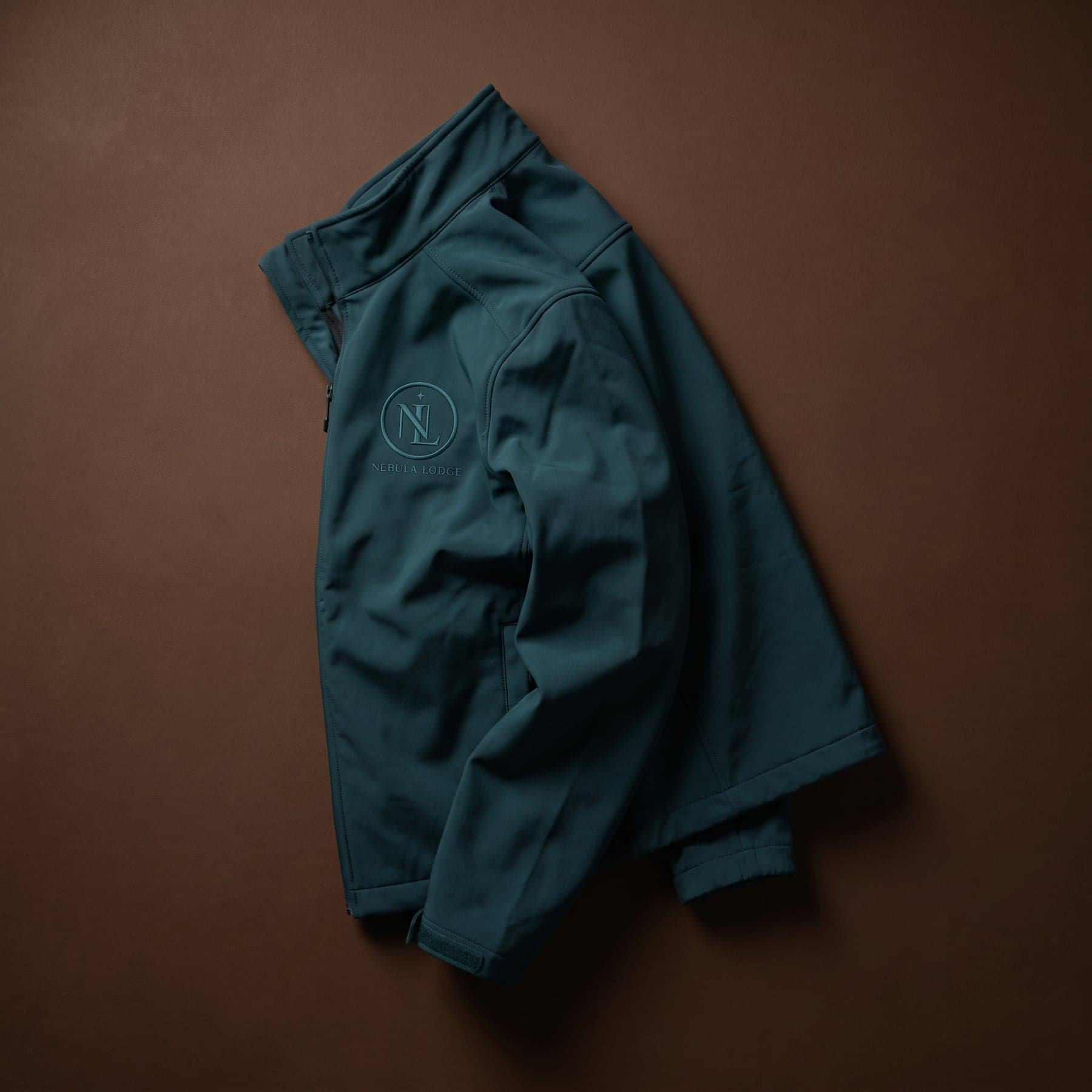 Geborduurde softshell bedrukken voor de receptie van een hotel